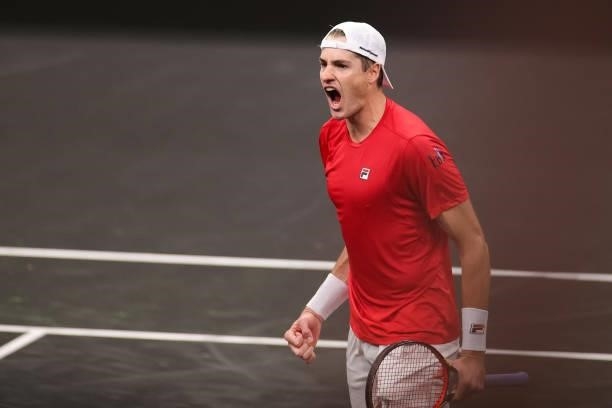 John Isner of Team World reacts to a shot against Alexander Zverev of Team Europe during the sixth match during Day 2 of the 2021 Laver Cup at TD...