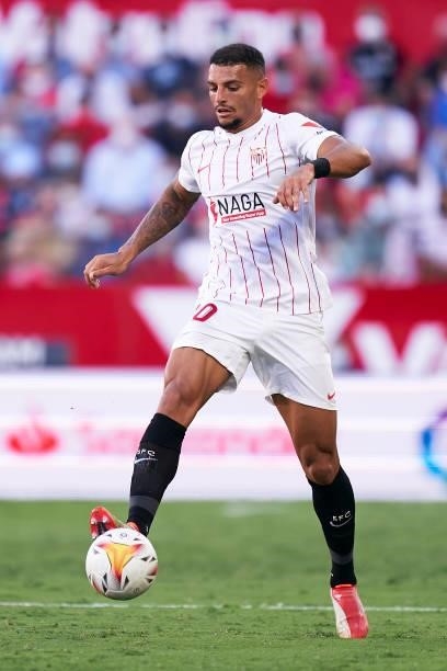 Diego Carlos of Sevilla FC runs with the ball during the La Liga Santander match between Sevilla FC and RCD Espanyol at Estadio Ramon Sanchez Pizjuan...