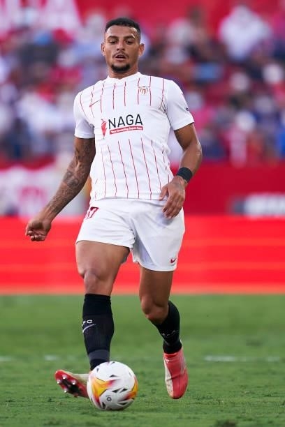 Diego Carlos of Sevilla FC passes the ball during the La Liga Santander match between Sevilla FC and RCD Espanyol at Estadio Ramon Sanchez Pizjuan on...