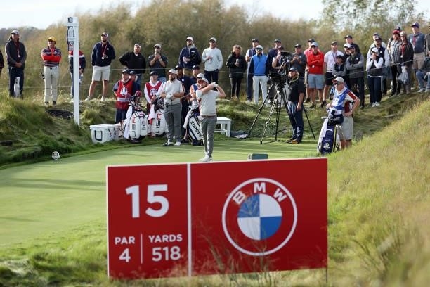 Tyrrell Hatton of England and team Europe plays his shot from the 15th tee during Saturday Afternoon Fourball Matches of the 43rd Ryder Cup at...