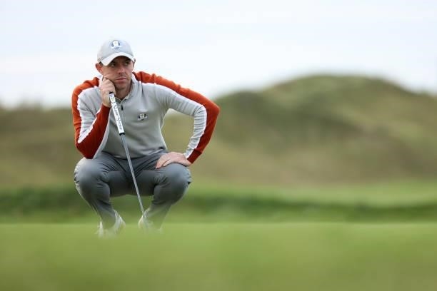 Rory McIlroy of Northern Ireland and team Europe lines up a putt during Saturday Afternoon Fourball Matches of the 43rd Ryder Cup at Whistling...