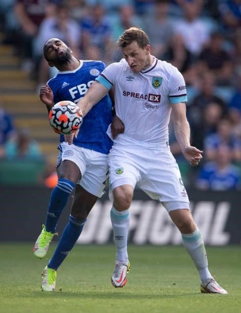 Chris Wood of Burnley and Ricardo Pereira of Leicester City in action during the Premier League match between Leicester City and Burnley at The King...