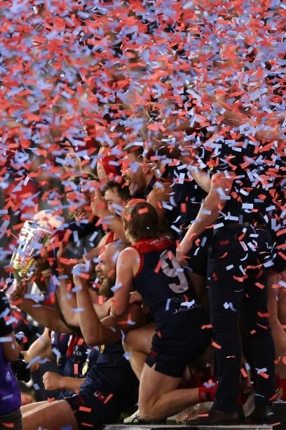 Max Gawn of the Demons celebrates with the trophy after winning the 2021 AFL Grand Final match between the Melbourne Demons and the Western Bulldogs...