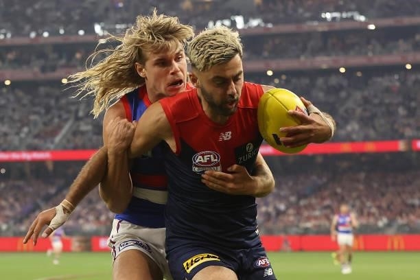 Bailey Smith of the Bulldogs tackles Christian Salem of the Demons during the 2021 AFL Grand Final match between the Melbourne Demons and the Western...