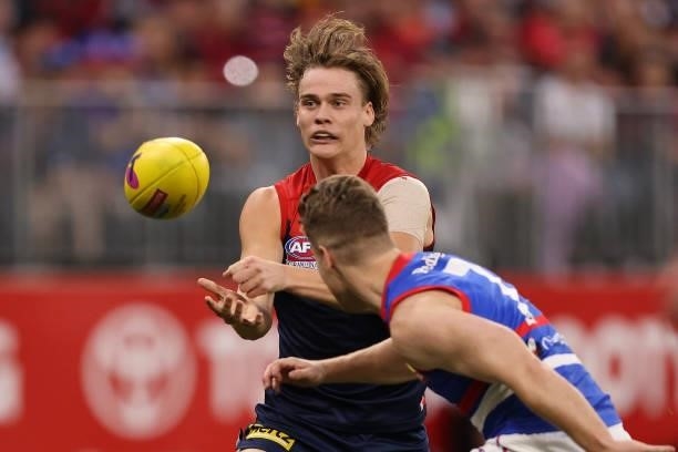 Trent Rivers of the Demons handballs during the 2021 AFL Grand Final match between the Melbourne Demons and the Western Bulldogs at Optus Stadium on...