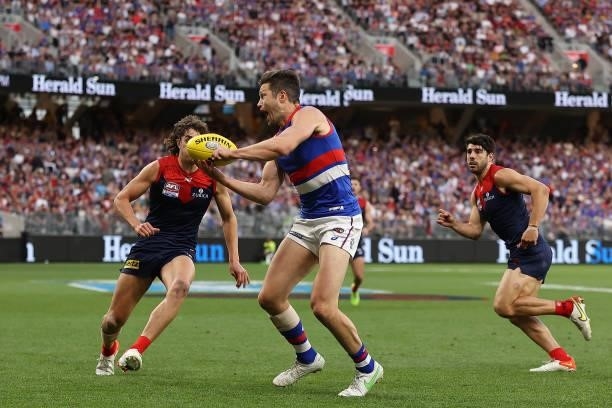 Stefan Martin of the Bulldogs handballs during the 2021 AFL Grand Final match between the Melbourne Demons and the Western Bulldogs at Optus Stadium...