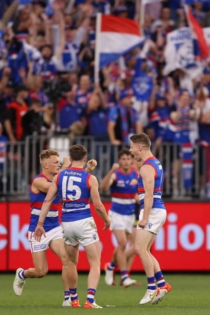 Lachie Hunter of the Bulldogs celebrates a goal during the 2021 AFL Grand Final match between the Melbourne Demons and the Western Bulldogs at Optus...