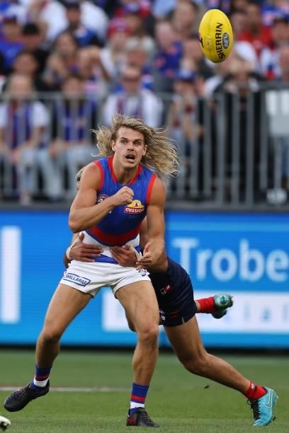 Bailey Smith of the Bulldogs handballs during the 2021 AFL Grand Final match between the Melbourne Demons and the Western Bulldogs at Optus Stadium...