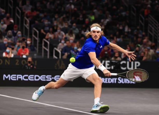 Stefanos Tsitsipas of Team Europe play a shot against John Isner and Nick Kyrgios of Team World during the eighth match during Day 2 of the 2021...
