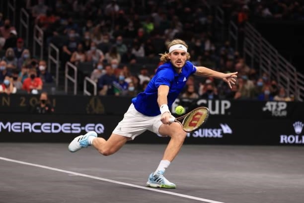 Stefanos Tsitsipas of Team Europe play a shot against John Isner and Nick Kyrgios of Team World during the eighth match during Day 2 of the 2021...