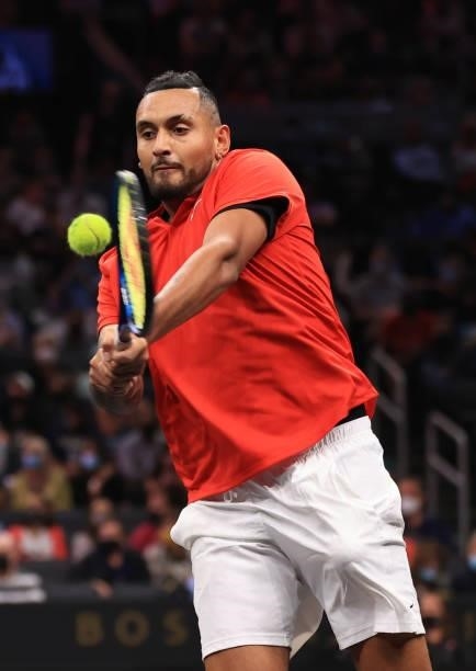 Nick Kyrgios of Team World plasy a shot against Andrey Rublev and Stefanos Tsitsipas of Team Europe during the eighth matc during Day 2 of the 2021...