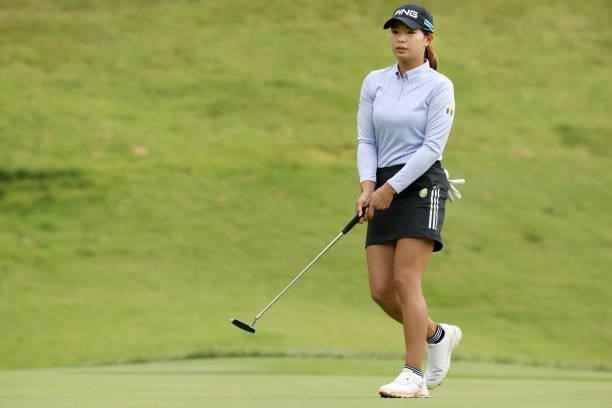 Hinako Shibuno of Japan reacts after a putt on the 5th green during the final round of the Miyagi TV Cup Dunlop Ladies Open at Rifu Golf Club on...