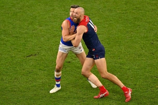 Stefan Martin of the Bulldogs and Max Gawn of the Demons compete for the ball during the 2021 AFL Grand Final match between the Melbourne Demons and...