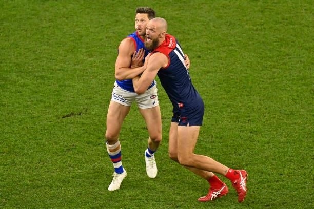 Stefan Martin of the Bulldogs and Max Gawn of the Demons compete for the ball during the 2021 AFL Grand Final match between the Melbourne Demons and...