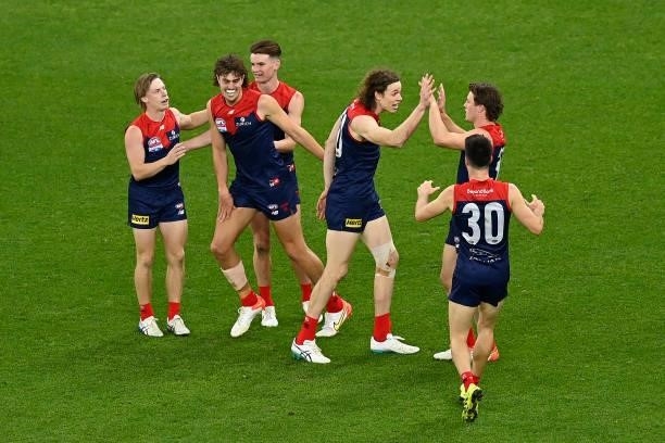 Demons celebrate after scoring during the 2021 AFL Grand Final match between the Melbourne Demons and the Western Bulldogs at Optus Stadium on...