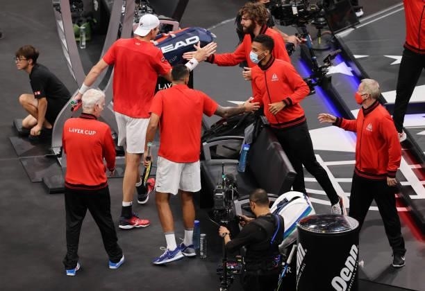 John Isner and Nick Kyrgios of Team World are cheered on by Team World during their match against Andrey Rublev and Stefanos Tsitsipas of Team Europe...