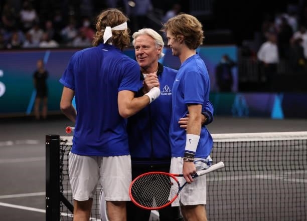 Andrey Rublev and Stefanos Tsitsipas of Team Europe are congratulated by Team Europe Captain Björn Borg after their win against John Isner and Nick...
