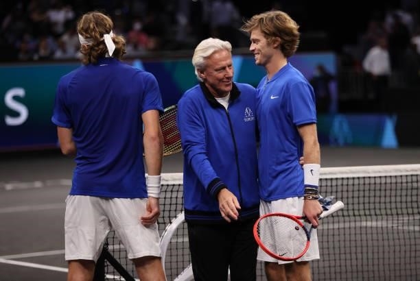 Andrey Rublev and Stefanos Tsitsipas of Team Europe are congratulated by Team Europe Captain Björn Borg after their win against John Isner and Nick...