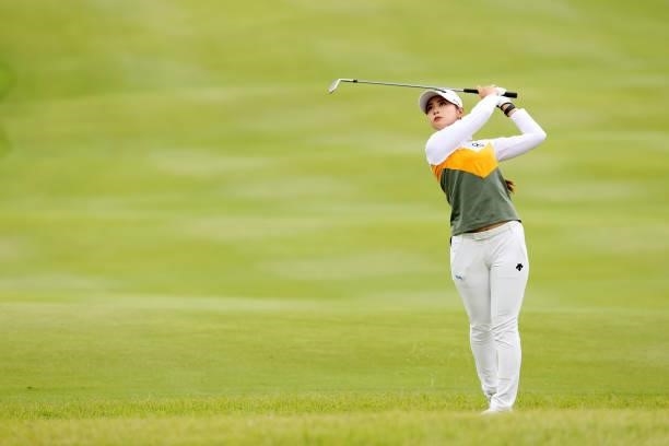 Asuka Kashiwabara of Japan hits her third shot on the 8th hole during the final round of the Miyagi TV Cup Dunlop Ladies Open at Rifu Golf Club on...