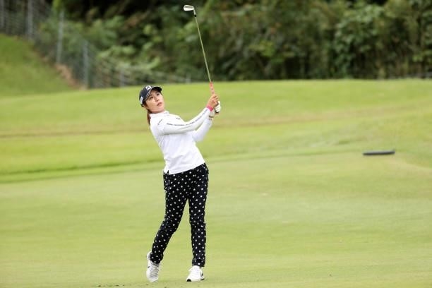 Momoko Osato of Japan hits her second shot on the 17th hole during the final round of the Miyagi TV Cup Dunlop Ladies Open at Rifu Golf Club on...