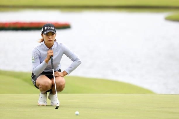 Hinako Shibuno of Japan lines up a putt on the 15th green during the final round of the Miyagi TV Cup Dunlop Ladies Open at Rifu Golf Club on...