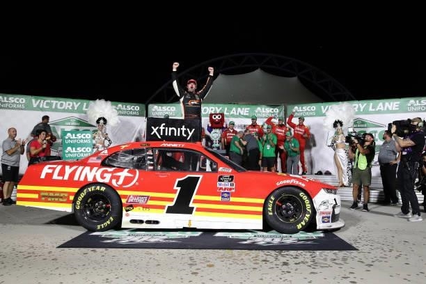 Josh Berry, driver of the PFJ Thank A Trucker Chevrolet, celebrates in victory lane after winning during the NASCAR Xfinity Series Alsco Uniforms 302...