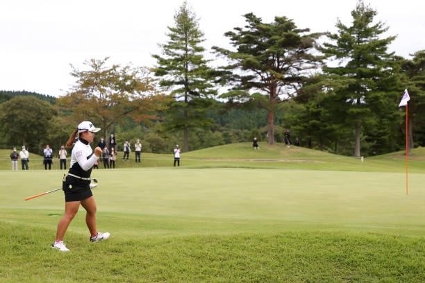 Saki Asai of Japan celebrates the chip-in-birdie on the 17th hole during the final round of the Miyagi TV Cup Dunlop Ladies Open at Rifu Golf Club on...