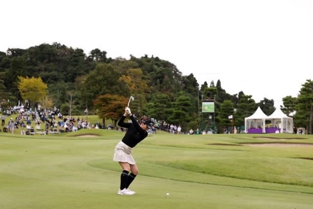Yuna Nishimura of Japan hits her third shot on the 18th hole during the final round of the Miyagi TV Cup Dunlop Ladies Open at Rifu Golf Club on...