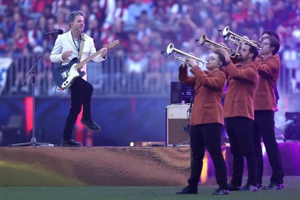 Eskimo Joe performs during the 2021 AFL Grand Final match between the Melbourne Demons and the Western Bulldogs at Optus Stadium on September 25,...