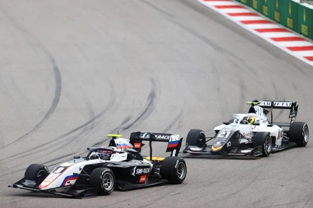 Aleksandr Smolyar of Russia and ART Grand Prix leads Lorenzo Colombo of Italy and Campos Racing during race 3 of Round 7:Sochi of the Formula 3...