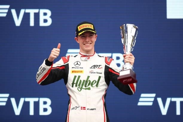 Second placed Frederik Vesti of Denmark and ART Grand Prix celebrates on the podium during race 3 of Round 7:Sochi of the Formula 3 Championship at...