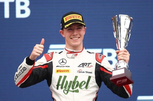 Second placed Frederik Vesti of Denmark and ART Grand Prix celebrates on the podium during race 3 of Round 7:Sochi of the Formula 3 Championship at...