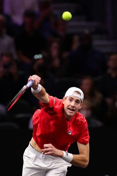 John Isner of Team World plays a shot against Andrey Rublev and Stefanos Tsitsipas of Team Europe during the eighth match during Day 2 of the 2021...