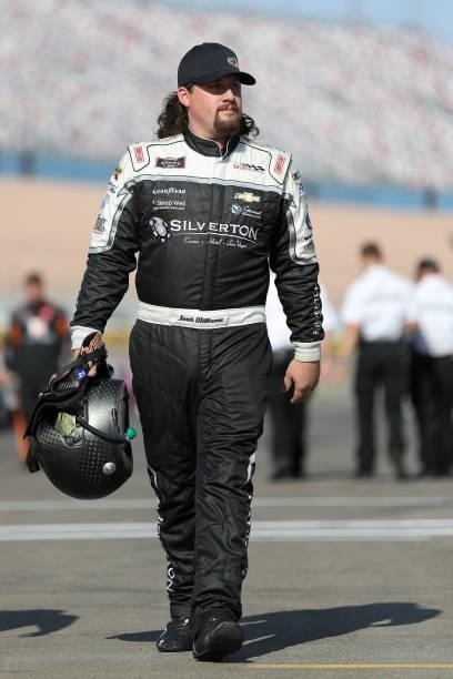 Josh Williams, driver of the Silverton Hotel & Casino Chevrolet, walks the grid prior to the NASCAR Xfinity Series Alsco Uniforms 302 at Las Vegas...