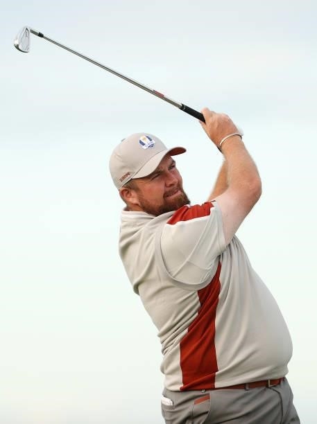 Shane Lowry of Ireland and team Europe plays his shot from the 17th tee during Saturday Afternoon Fourball Matches of the 43rd Ryder Cup at Whistling...
