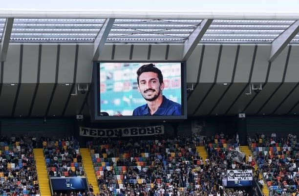 The big Screen project the photo of Davide Astori during the Serie A match between Udinese Calcio and ACF Fiorentina at Dacia Arena on September 26,...