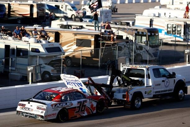 The Globocam Chevrolet, driven by Alex Labbe is towed after an on-track incident during the NASCAR Xfinity Series Alsco Uniforms 302 at Las Vegas...