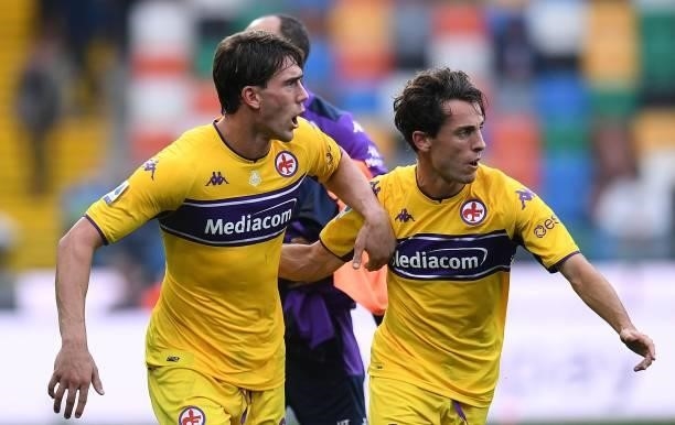 Dusan Vlahovic and Alvaro Odriozola of ACF Fiorentina celebrate the victory during the Serie A match between Udinese Calcio and ACF Fiorentina at...