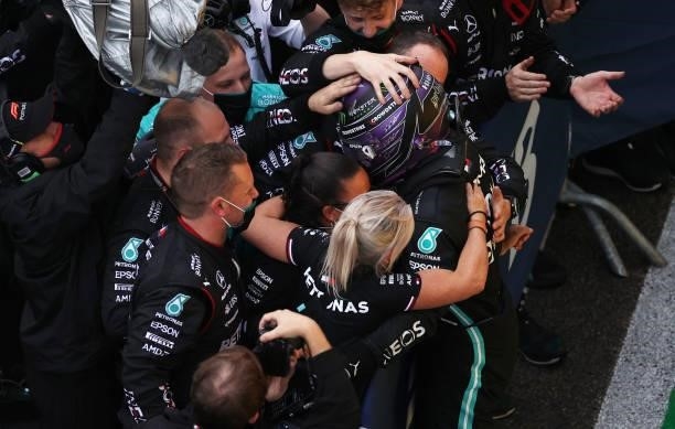 Race winner Lewis Hamilton of Great Britain and Mercedes GP celebrates in parc ferme during the F1 Grand Prix of Russia at Sochi Autodrom on...