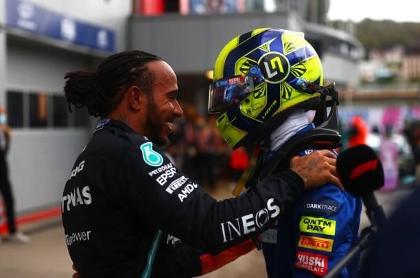 Race winner Lewis Hamilton of Great Britain and Mercedes GP hugs Lando Norris of Great Britain and McLaren F1 in parc ferme during the F1 Grand Prix...