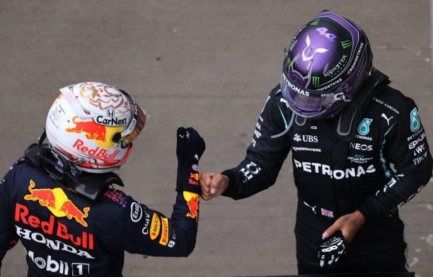 Race winner Lewis Hamilton of Great Britain and Mercedes GP celebrates with second placed Max Verstappen of Netherlands and Red Bull Racing in parc...
