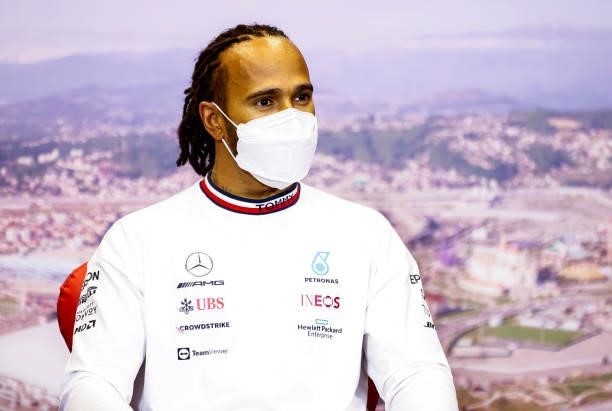 Race winner Lewis Hamilton of Great Britain and Mercedes GP talks in the press conference after the F1 Grand Prix of Russia at Sochi Autodrom on...