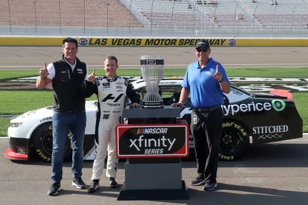 Allmendinger, driver of the Hyperice Chevrolet, Matt Kaulig, owner of Kaulig Racing and Chris Rice is the President of Kaulig Racing pose for photos...