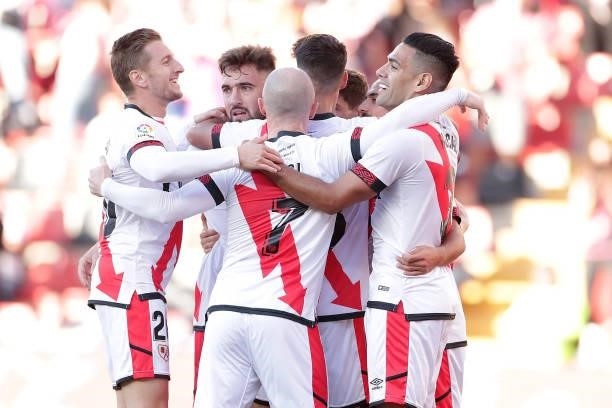 Alvaro Garcia of Rayo Vallecano celebrates with team mates after scoring their side's first goal during the LaLiga Santander match between Rayo...