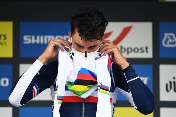 Gold medalist Julian Alaphilippe of France puts on Rainbow World Champion Jersey and celebrates winning during the medal ceremony after the 94th UCI...