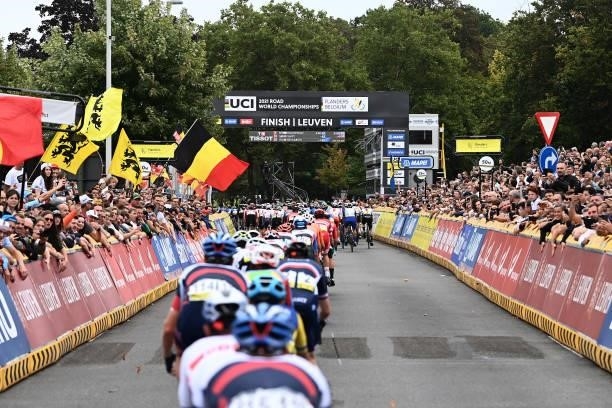 General view of the Peloton passing through Leuven City while fans cheer during the 94th UCI Road World Championships 2021 - Men Elite Road Race a...