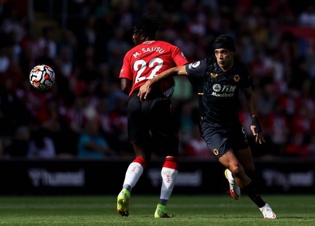Raul Jimenez of Wolverhampton Wanderers is challenged by Mohammed Salisu of Southampton during the Premier League match between Southampton and...