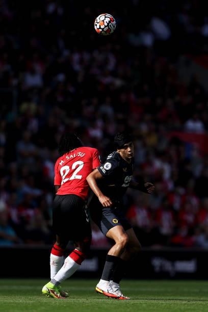 Raul Jimenez of Wolverhampton Wanderers is challenged by Mohammed Salisu of Southampton during the Premier League match between Southampton and...