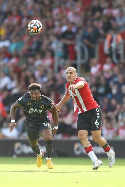 Adama Traore of Wolverhampton Wanderers battles for possession against Oriol Romeu of Southampton during the Premier League match between Southampton...