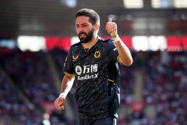 Joao Moutinho of Wolverhampton Wanderers shows appreciation to the fans as he prepares to take a corner during the Premier League match between...